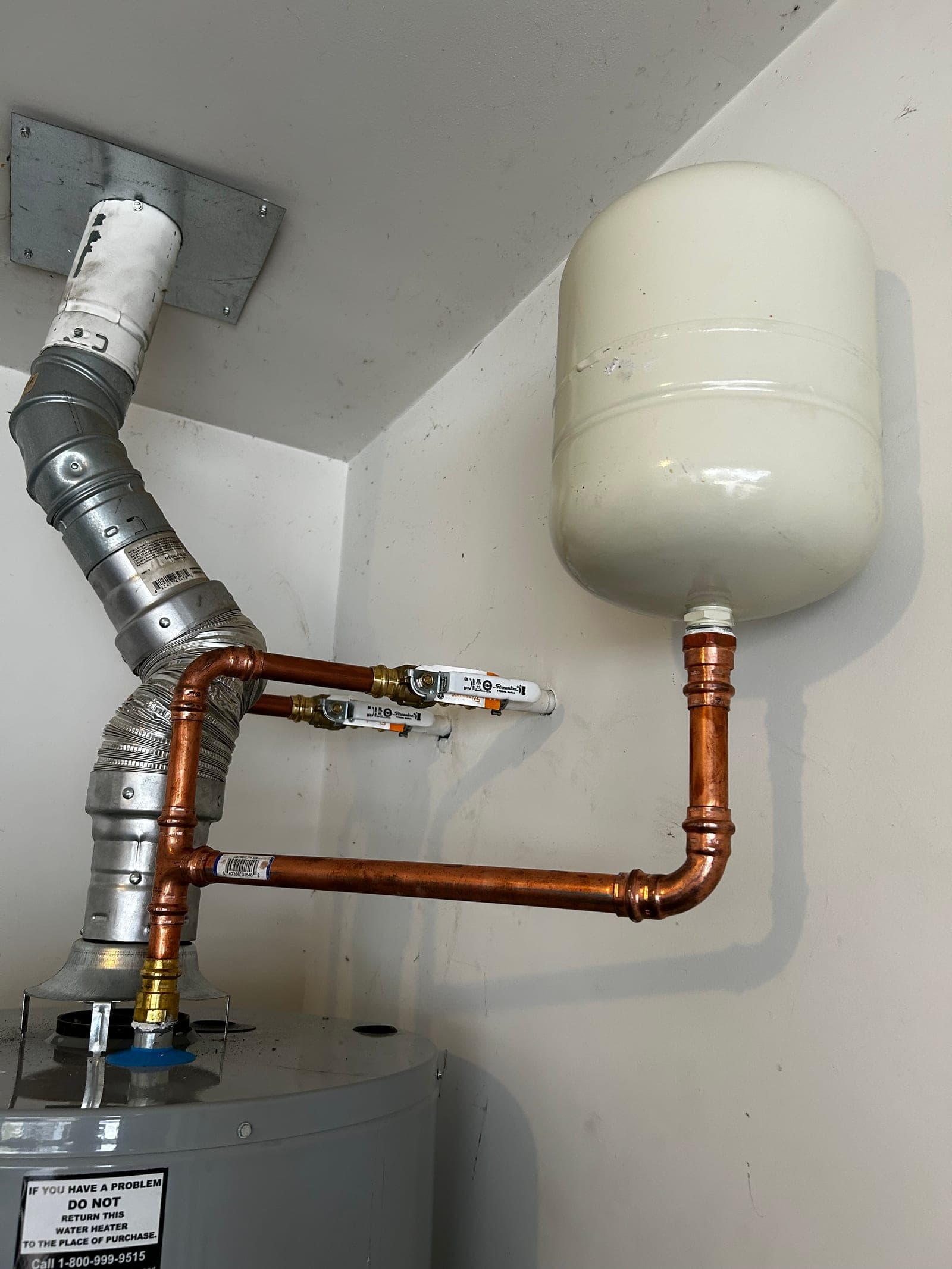 Water heater expansion tank and copper piping installation